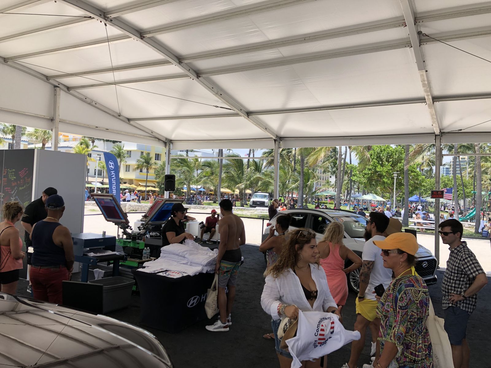 Merch Troop live screen-printing station running at a Kansas City event